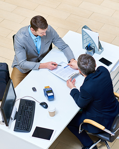 Businessman Signing Car Lease Agreement